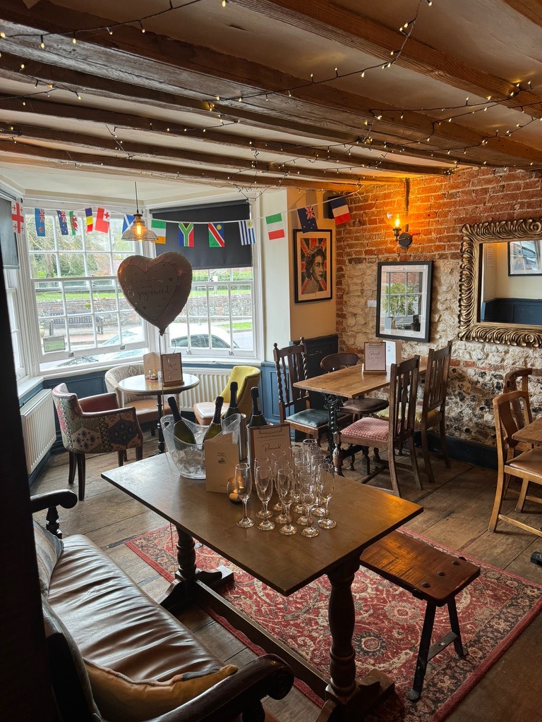 Bar Snug with champagne glasses and fairy lights